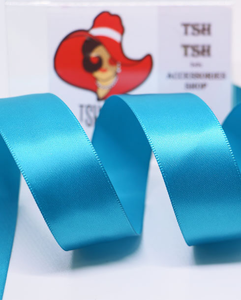 ริบบิ้นผ้าซิลค์ ขนาด 1 นิ้ว สีฟ้าน้ำทะเล เงา 1 หน้า ยาว 50 หลา #181